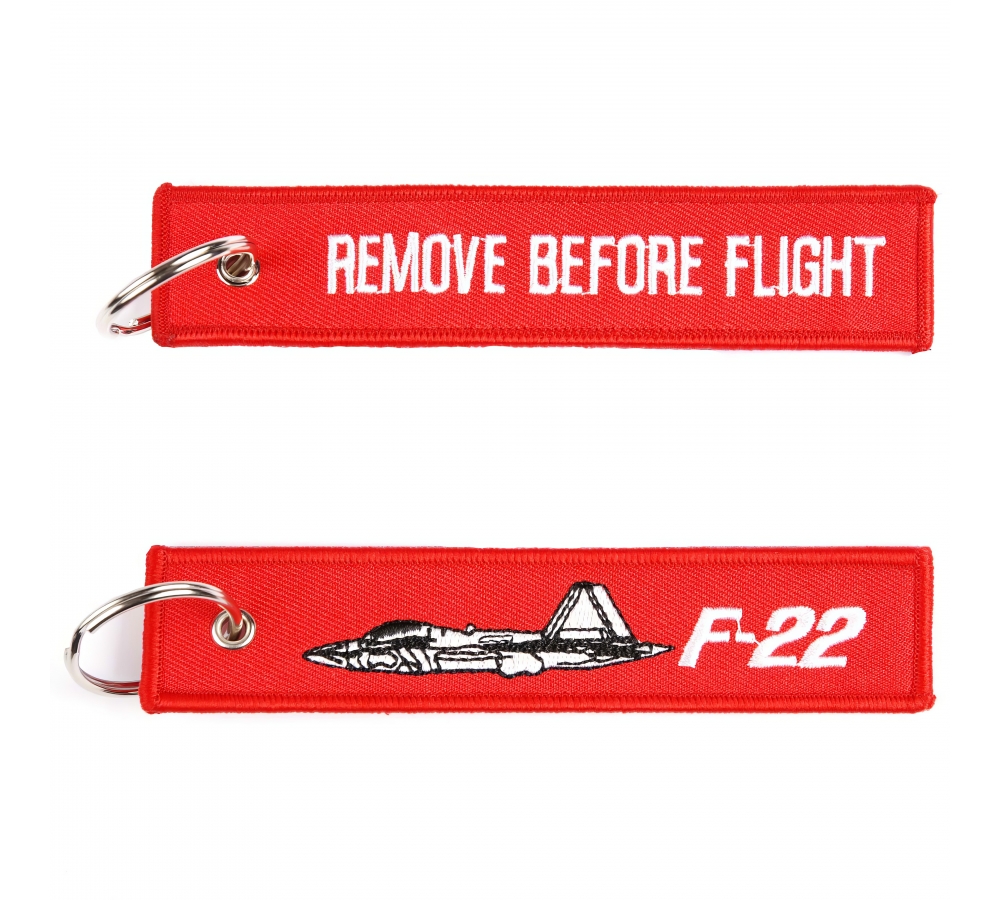 Llavero "Remove Before Flight F‑22", 12,5 × 3 cm, rojo, Fostex Garments